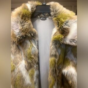Faux fur coat.  Very stylish, warm, and soft